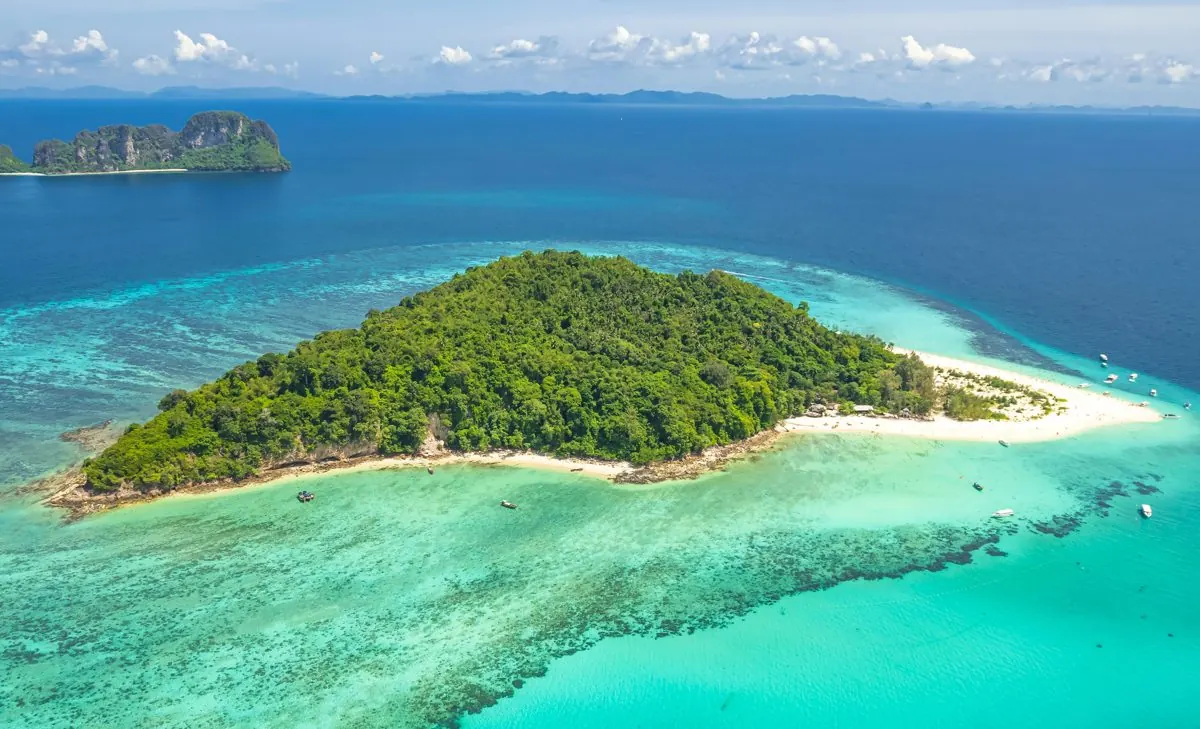 Bamboo Island and its coral reef from above
