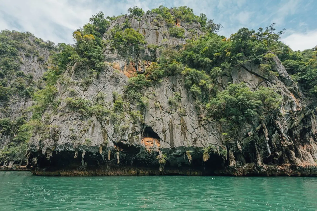 Limestone face and sea caves at Panak Island