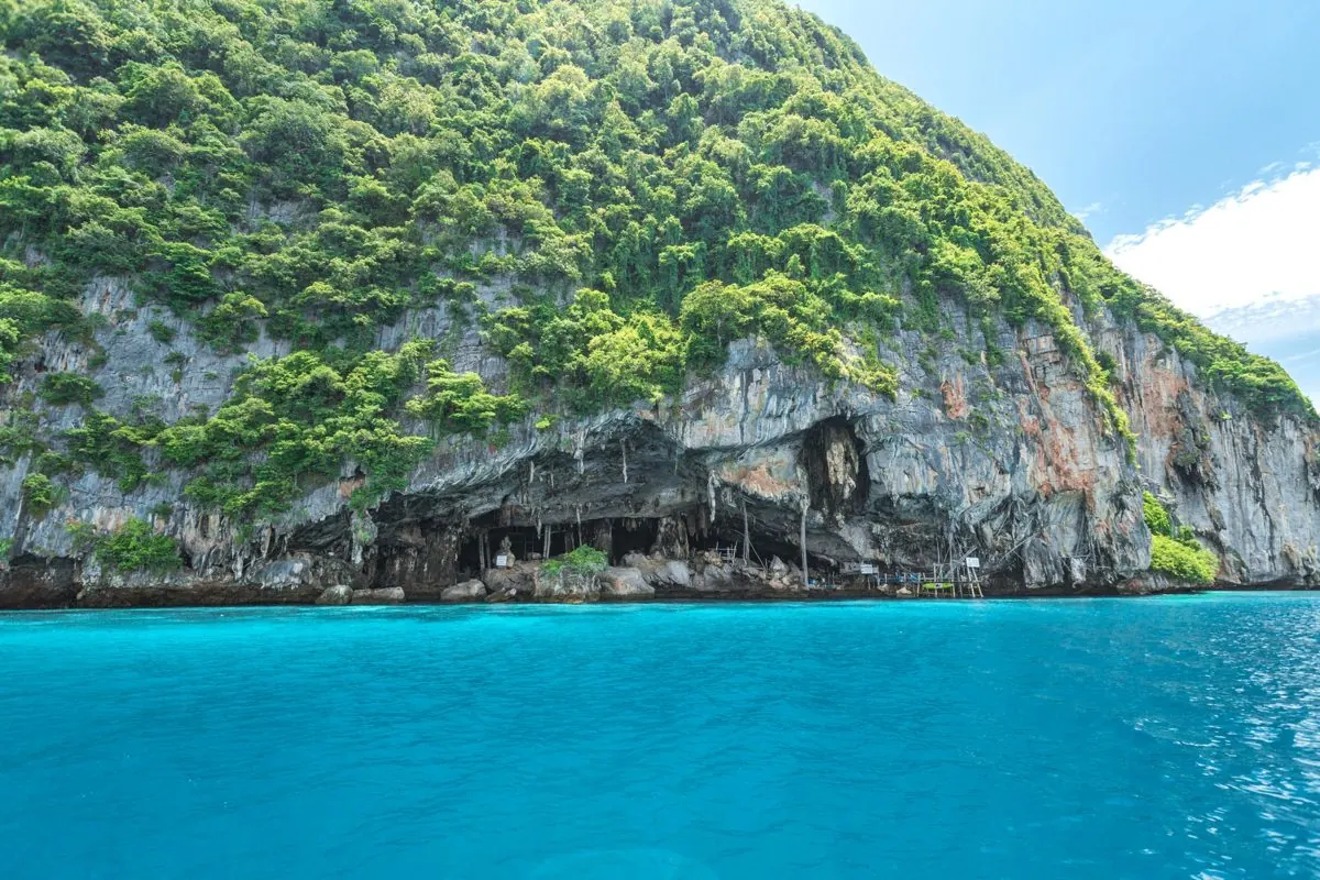 Viking Cave and the green hill of Phi Phi Leh